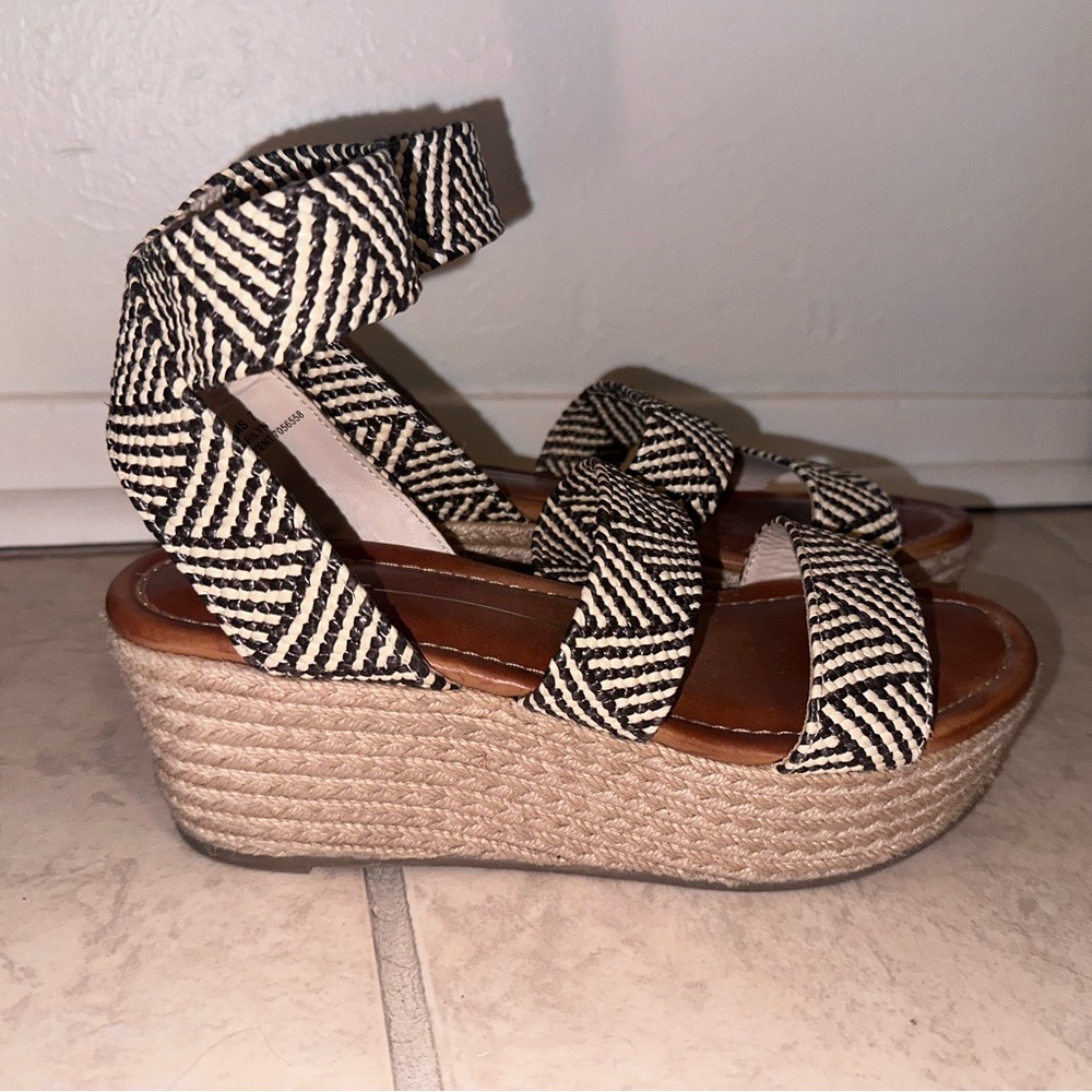 White and black platform heels